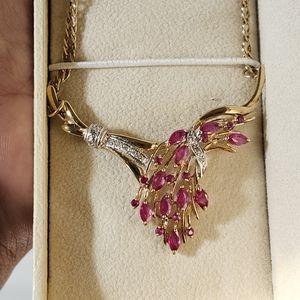 Beautiful Vintage real ruby and diamond necklace in brand new condition.